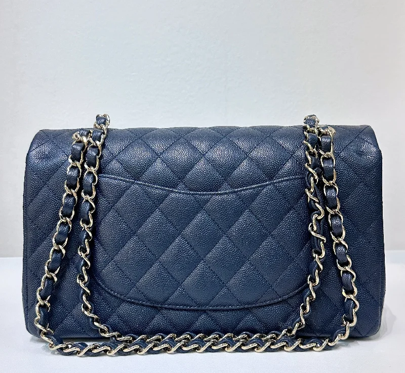 Chanel Quilted Leather Shoulder Bag for FashionistasCHANEL Caviar Quilted Medium Double Flap 18B Navy